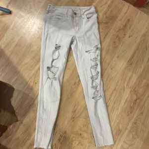 Off white, ripped, skinny, jeans. American eagle. Size 0, super stretch.